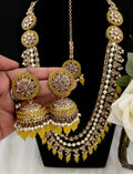 Long Necklace with Tikka and Jhumka Earrings adorned with Yellow Pearls