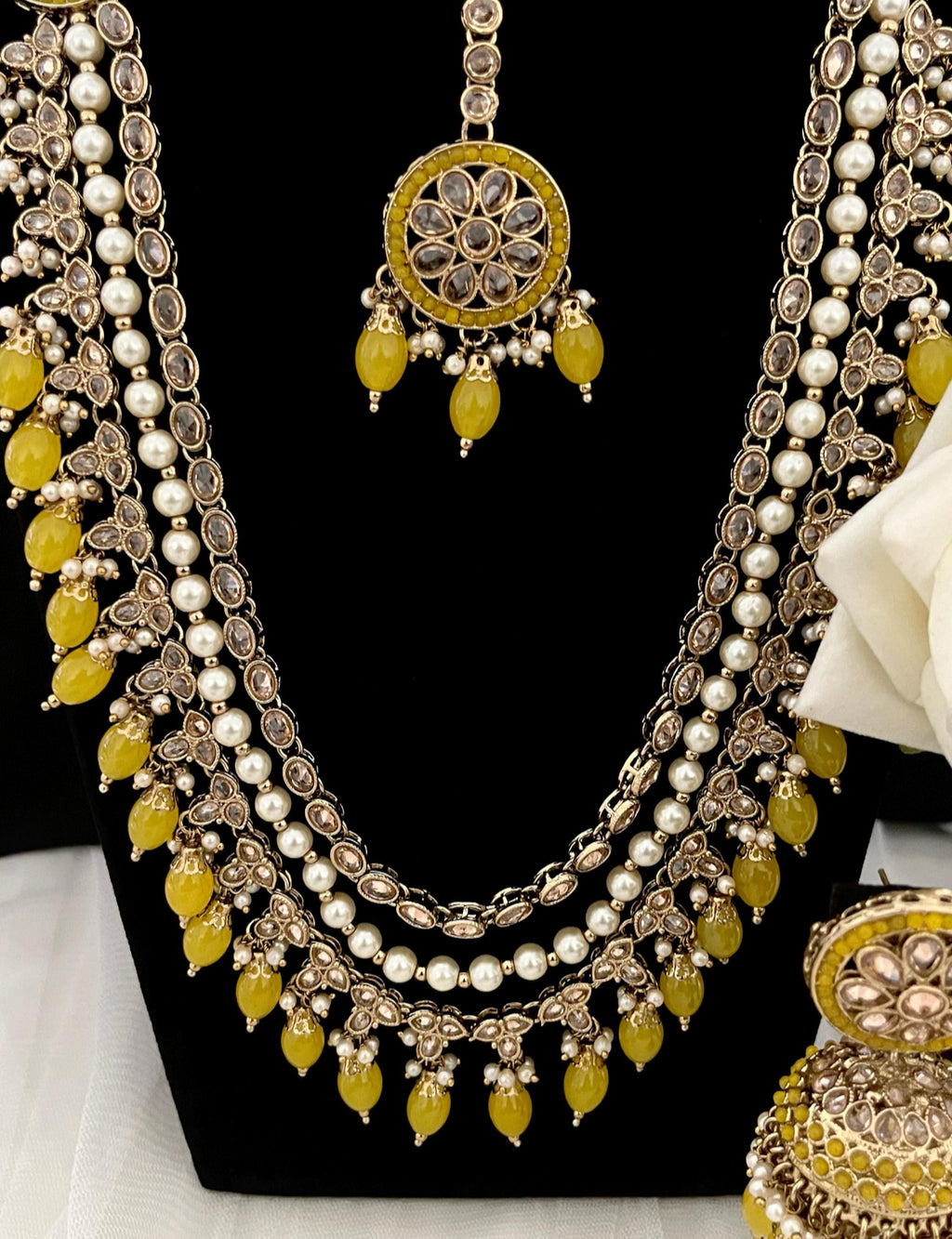 Long Necklace with Tikka and Jhumka Earrings adorned with Yellow Pearls