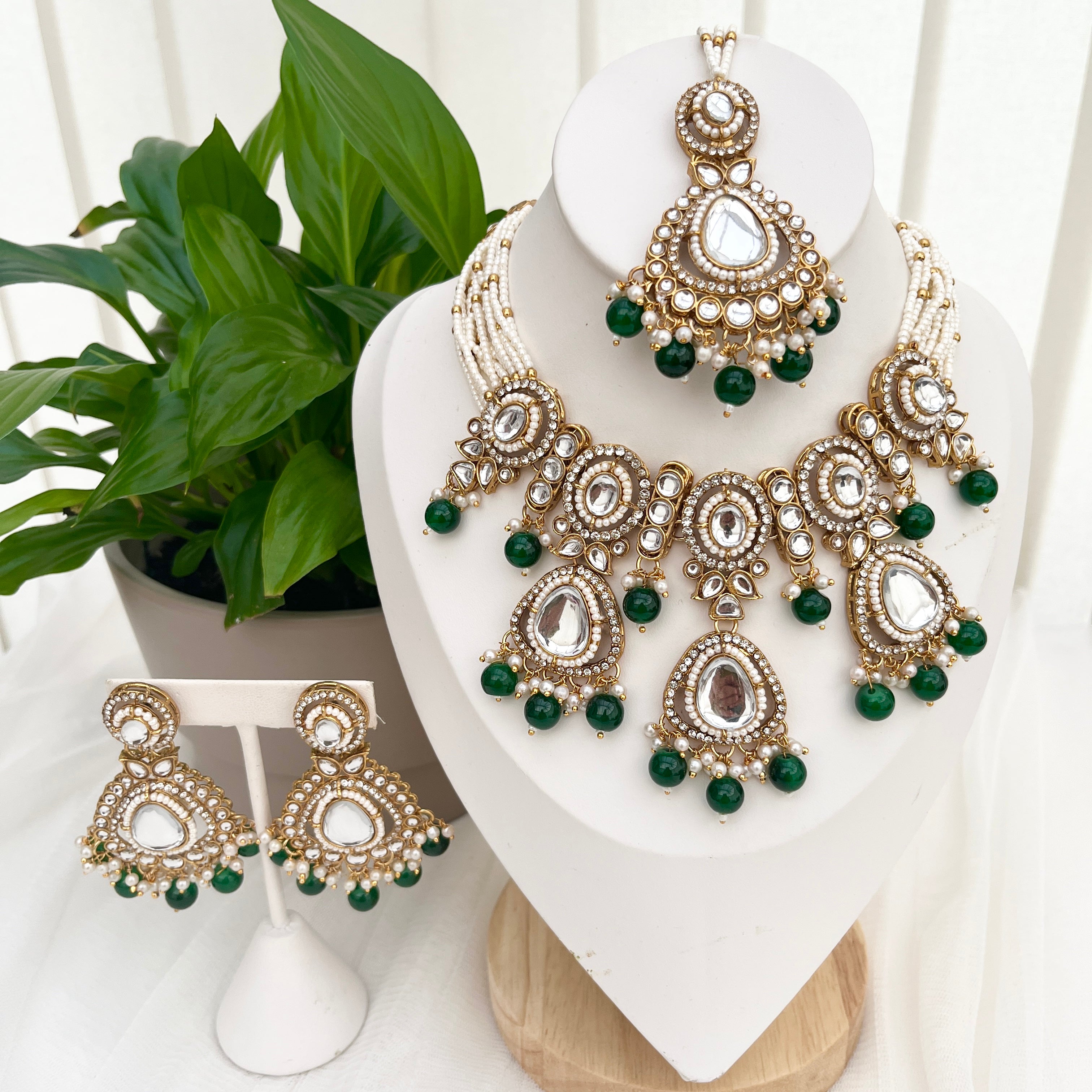 Beautiful green pearl and gold plated Kundan Jewellery set.