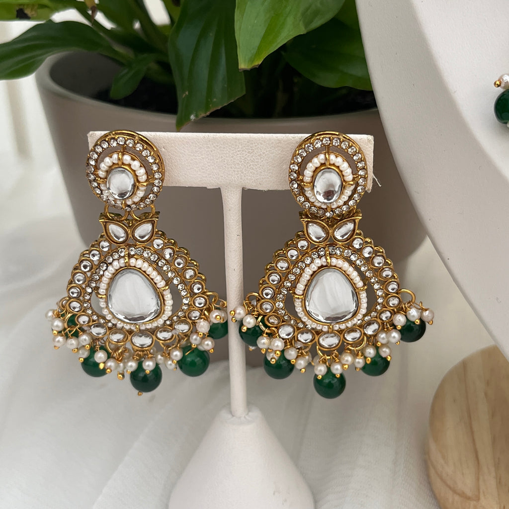 Beautiful green pearl and gold plated Kundan Jewellery set.