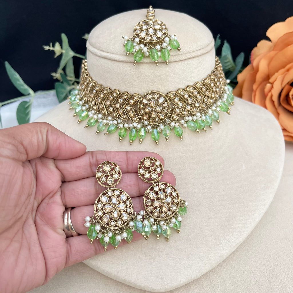 Lime green crystal beads choker set with Polki stones Set includes tikka and earrings
