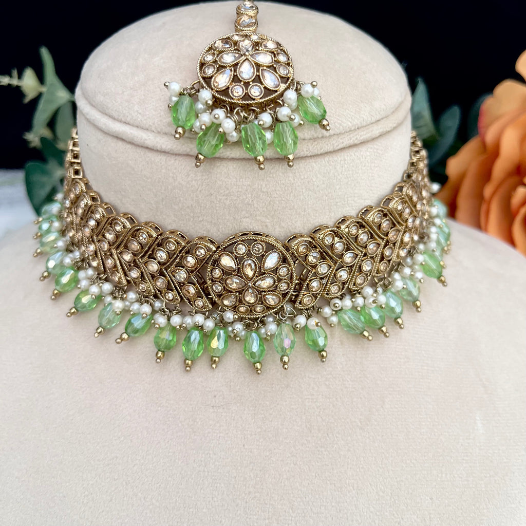 Lime green crystal beads choker set with Polki stones Set includes tikka and earrings
