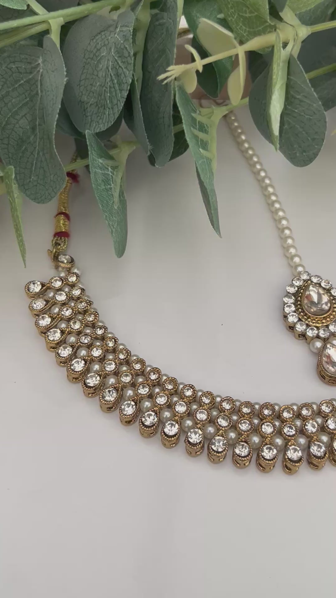 Reverse AD Gold and Transparent Stone coloured Jewellery