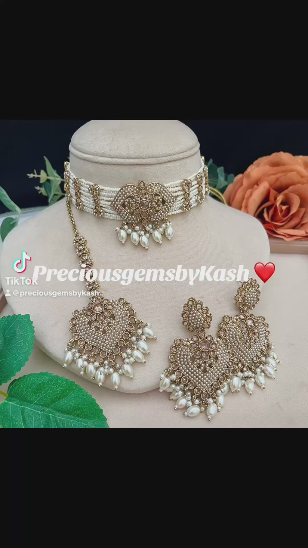 Beaded White pearl choker with Polki stones and pearls.